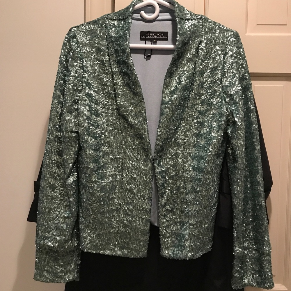 Unique and beautiful jacket.   Imported.